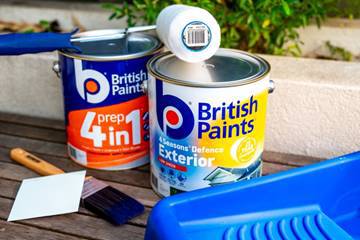 Paint cans of paint and paint brush

AI-generated content may be incorrect.